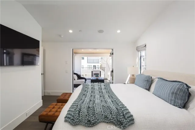 a living room with a couch and a flat screen tv