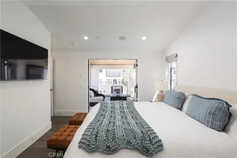 a living room with a couch and a flat screen tv