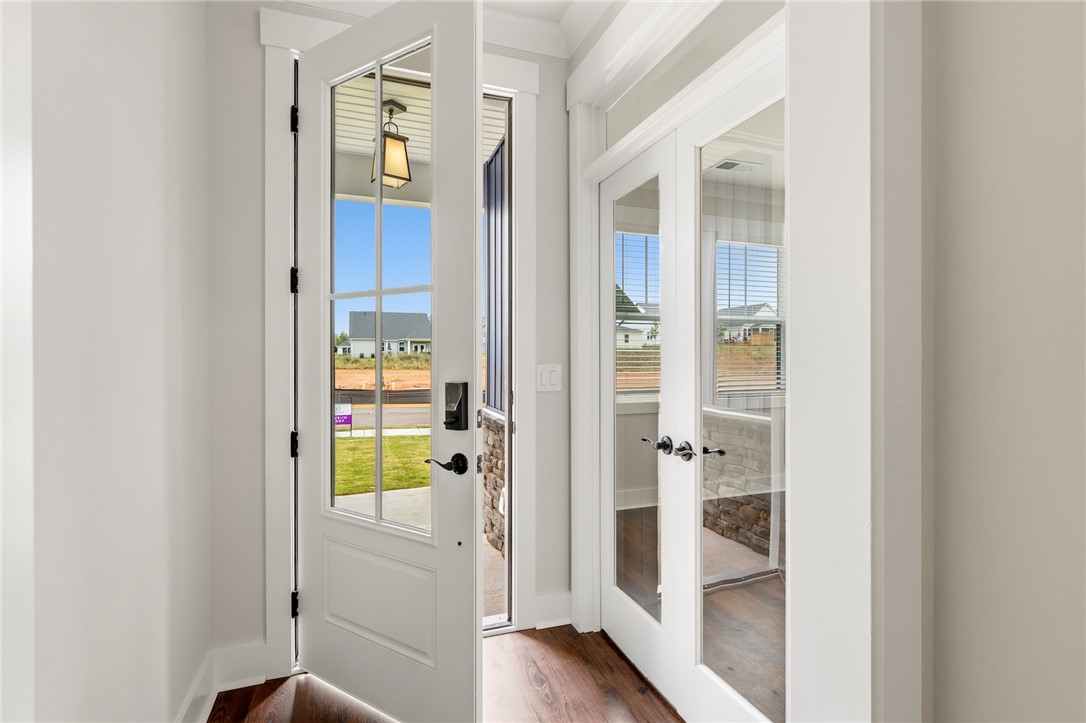 310 Bluestem Court Anderson, SC 29621 - Photo 4 of 36 Step into this home with elegant glass-paneled doors that invite natural light.