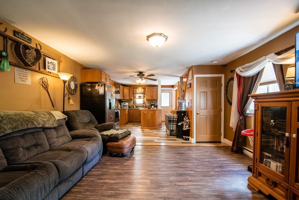 2 Chestnut Street Leicester, MA 01611 - Photo 16 of 30 a living room with furniture and a flat screen tv