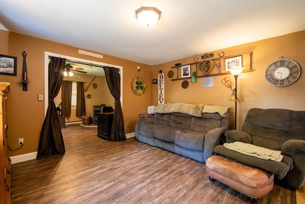 2 Chestnut Street Leicester, MA 01611 - Photo 17 of 30 a living room with furniture and a wooden floor