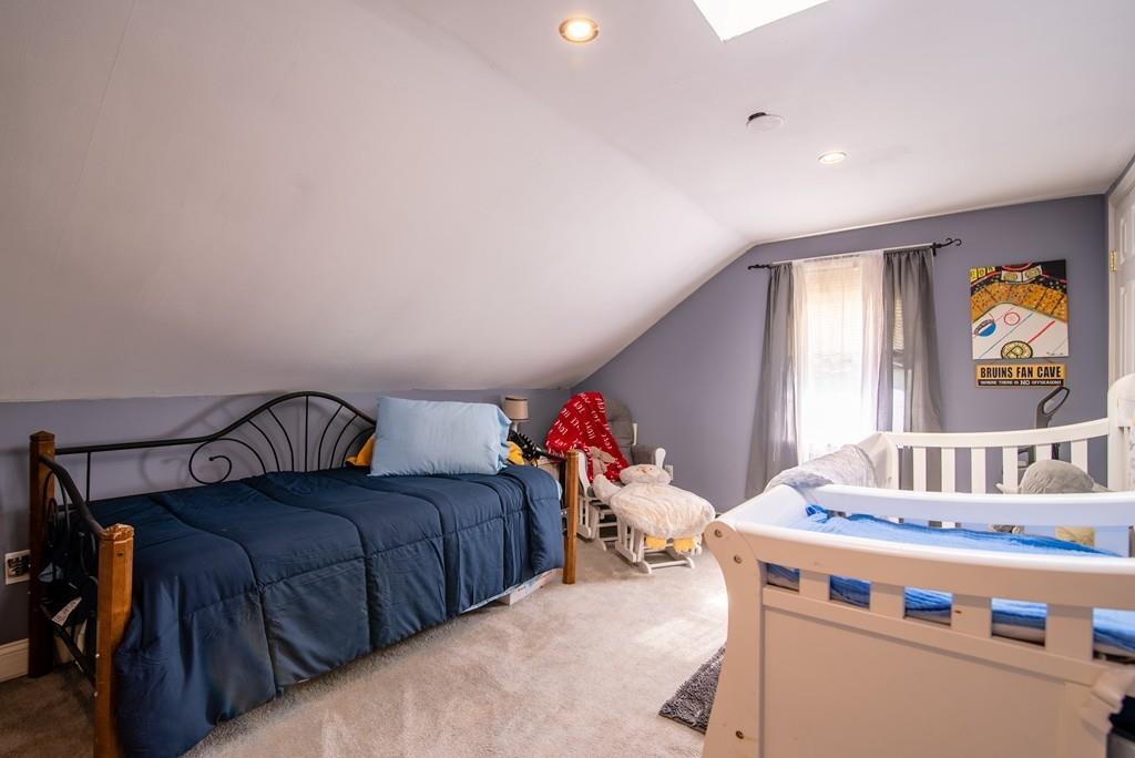 2 Chestnut Street Leicester, MA 01611 - Photo 25 of 30 a living room with a bed furniture and window