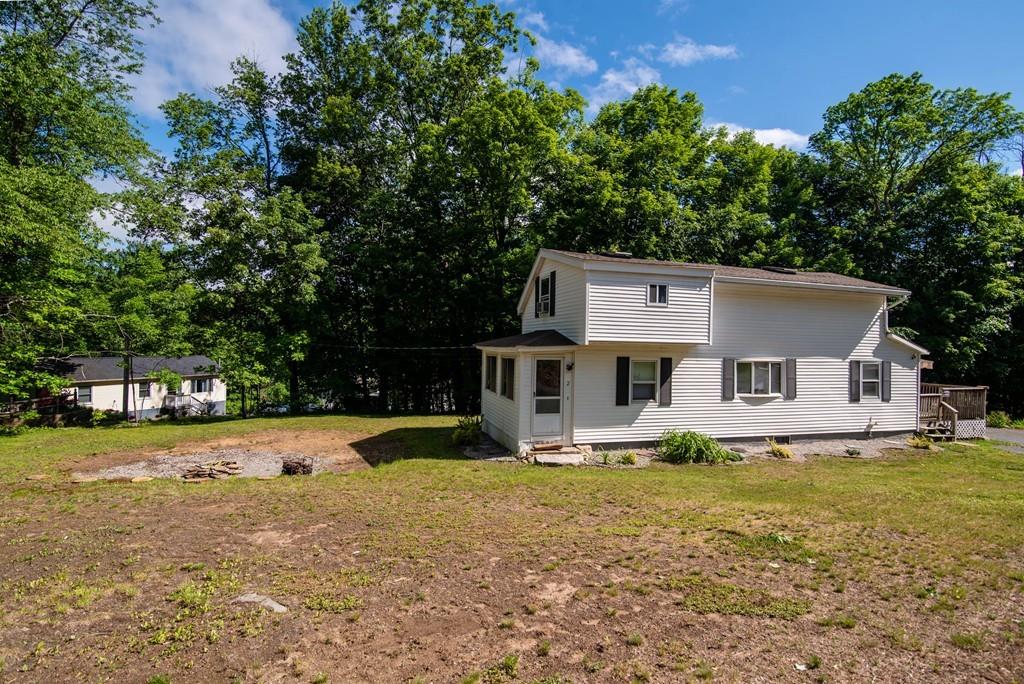 2 Chestnut Street Leicester, MA 01611 - Photo 28 of 30 a view of a house with backyard and trees