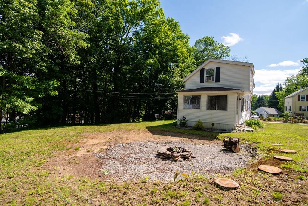2 Chestnut Street Leicester, MA 01611 - Photo 29 of 30 a front view of a house with a yard