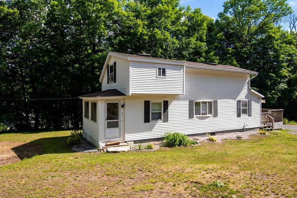 2 Chestnut Street Leicester, MA 01611 - Photo 4 of 30 a view of a house with a swimming pool