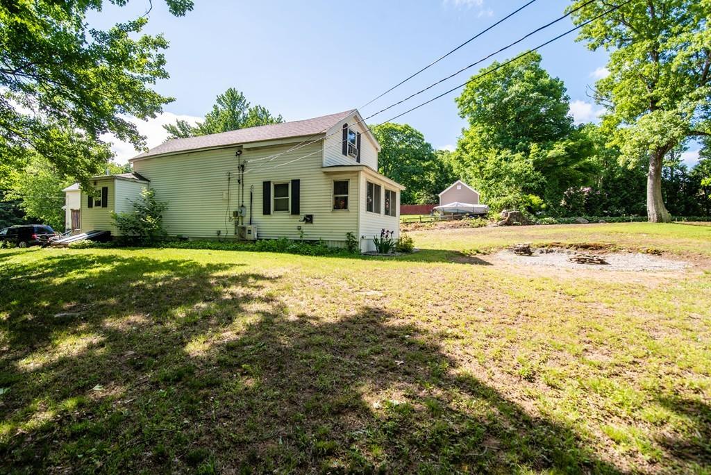 2 Chestnut Street Leicester, MA 01611 - Photo 5 of 30 a view of a house with a yard