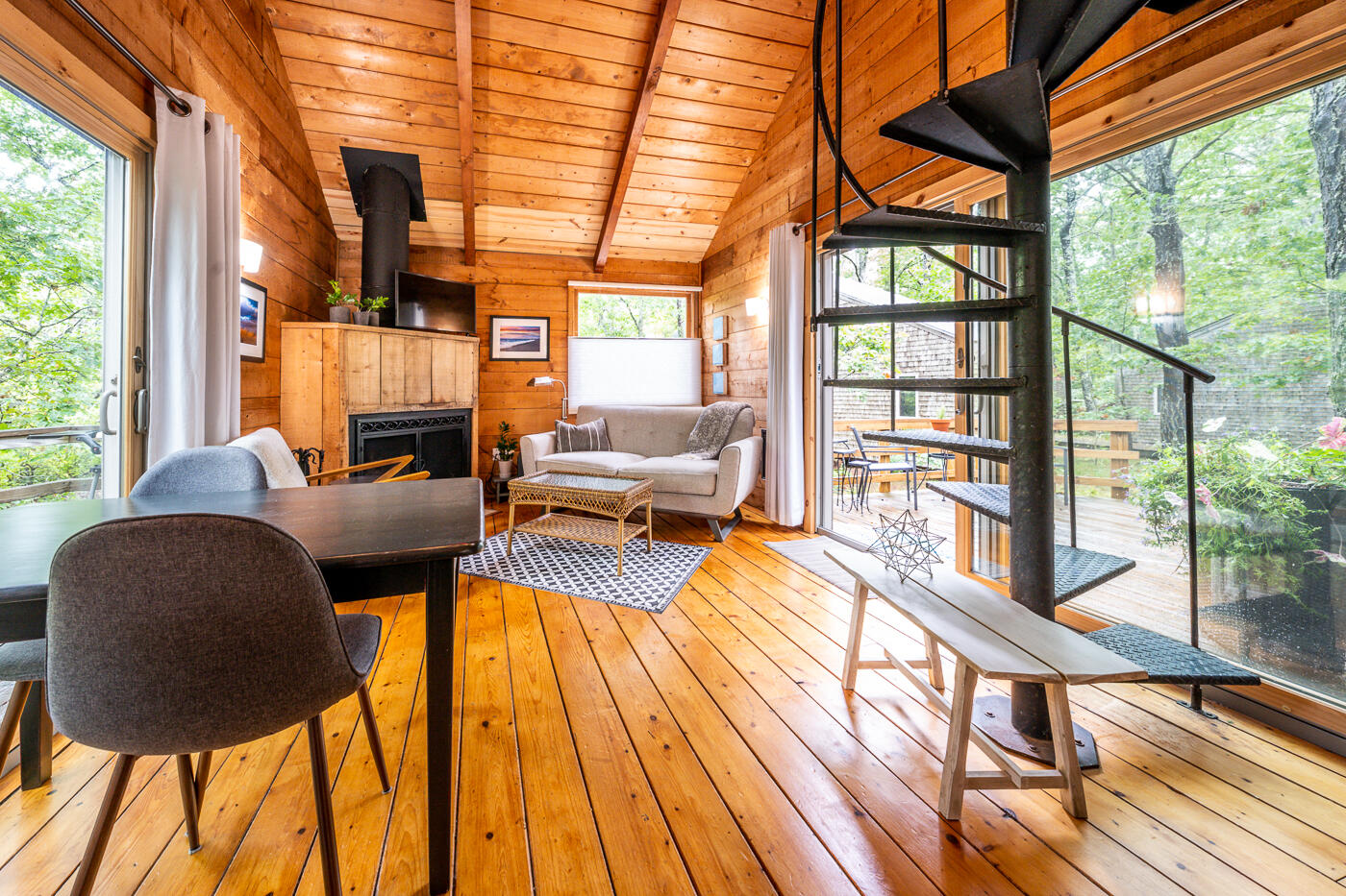 1780 Route 6, Unit B3 Wellfleet, MA 02667 - Photo 12 of 22 a living room with furniture and a floor to ceiling window