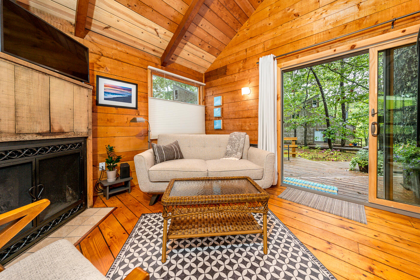 1780 Route 6, Unit B3 Wellfleet, MA 02667 - Photo 13 of 22 a building outdoor space with patio furniture and wooden floor