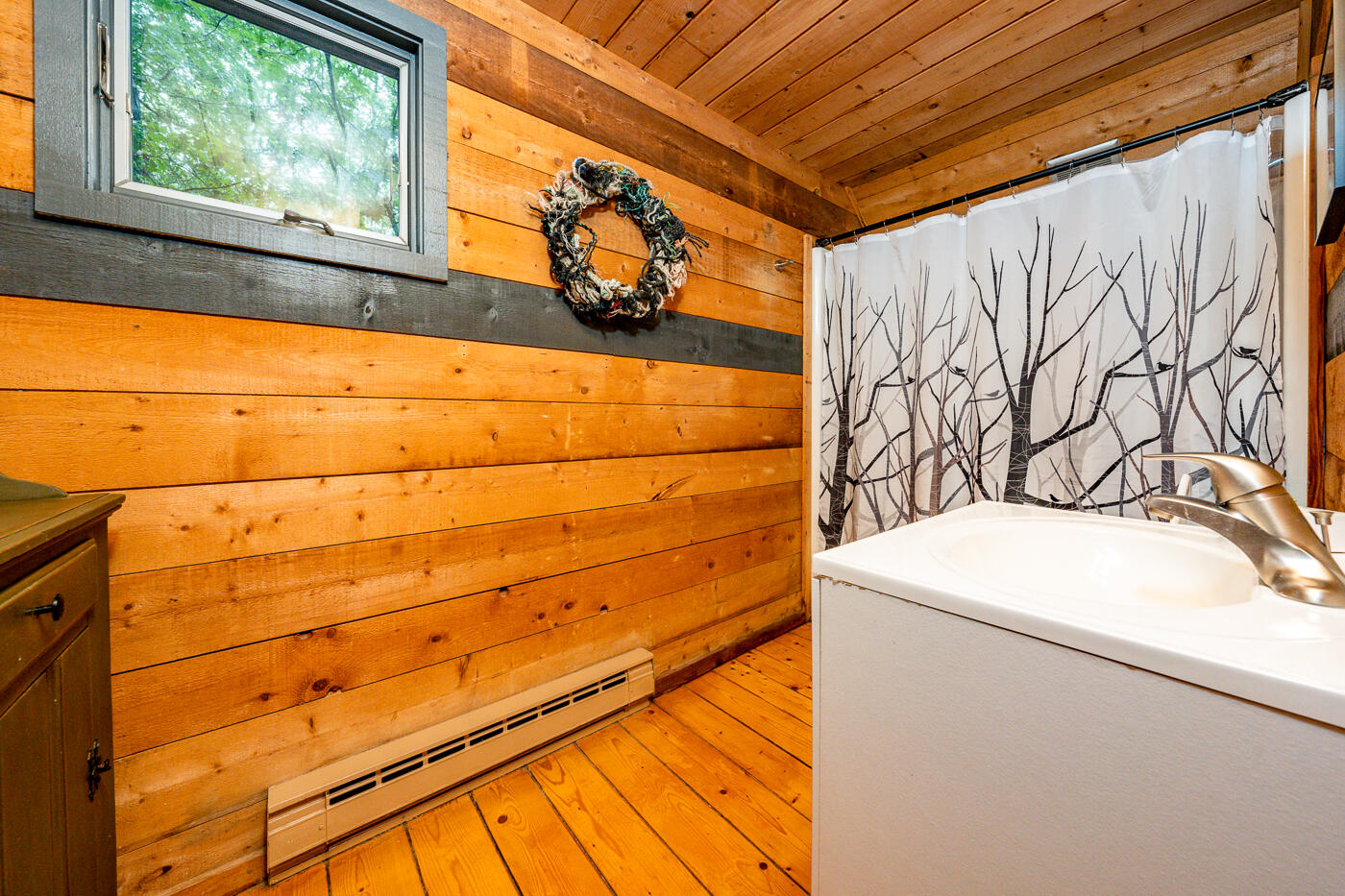 1780 Route 6, Unit B3 Wellfleet, MA 02667 - Photo 17 of 22 a bathroom with a sink and a shower