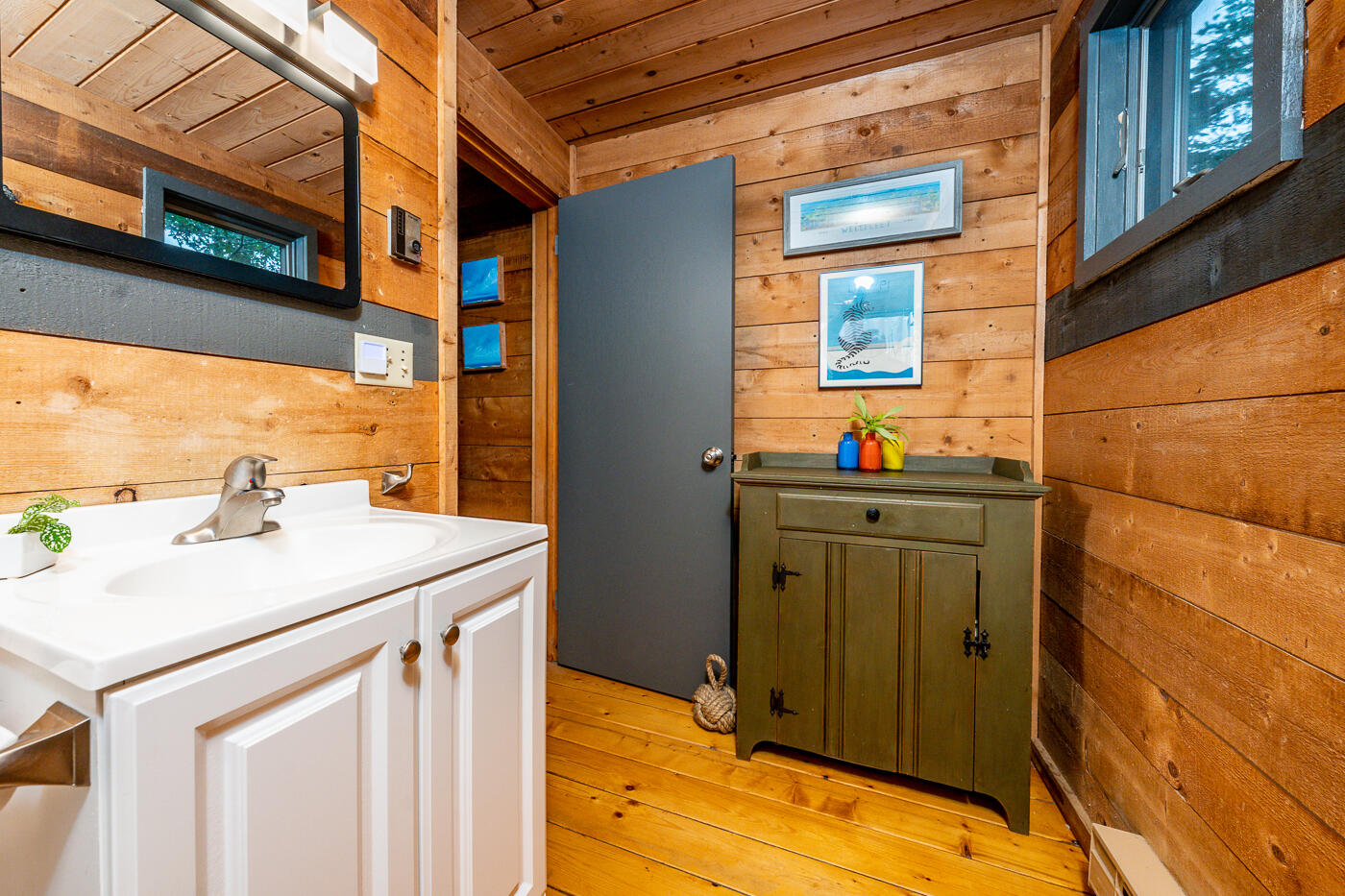 1780 Route 6, Unit B3 Wellfleet, MA 02667 - Photo 18 of 22 a bathroom with a sink and vanity