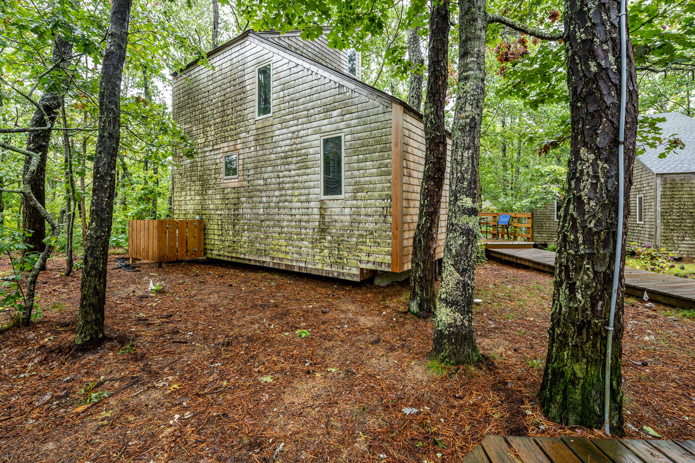 1780 Route 6, Unit B3 Wellfleet, MA 02667 - Photo 5 of 22 a view of a house with backyard and garden