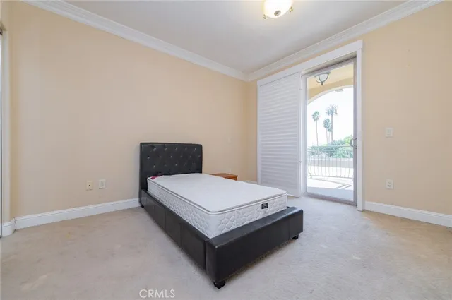 a room with a bed and window