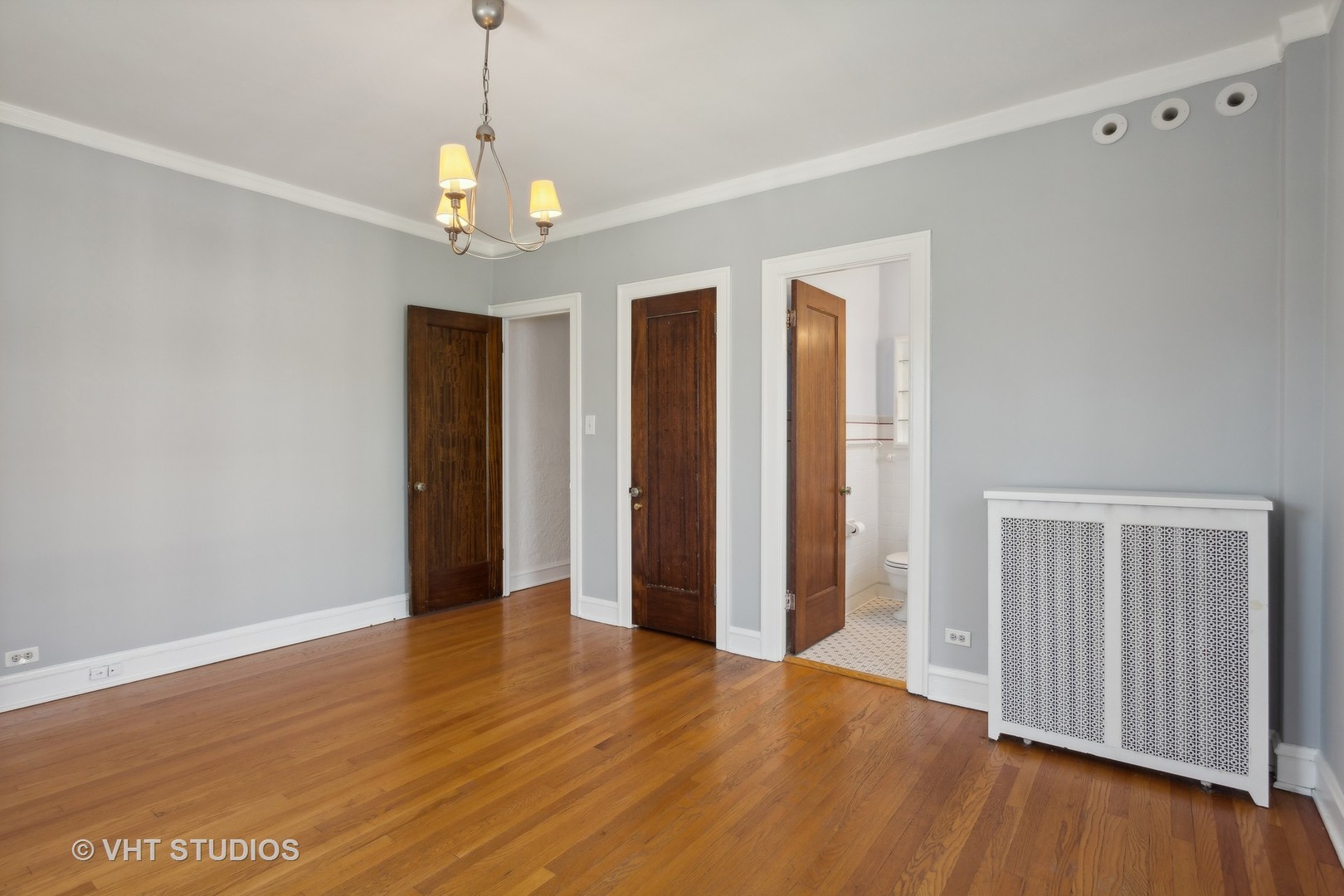 482 Sheridan Road, Unit 3 Evanston, IL 60202 - Photo 20 of 39 a view of an empty room with wooden floor