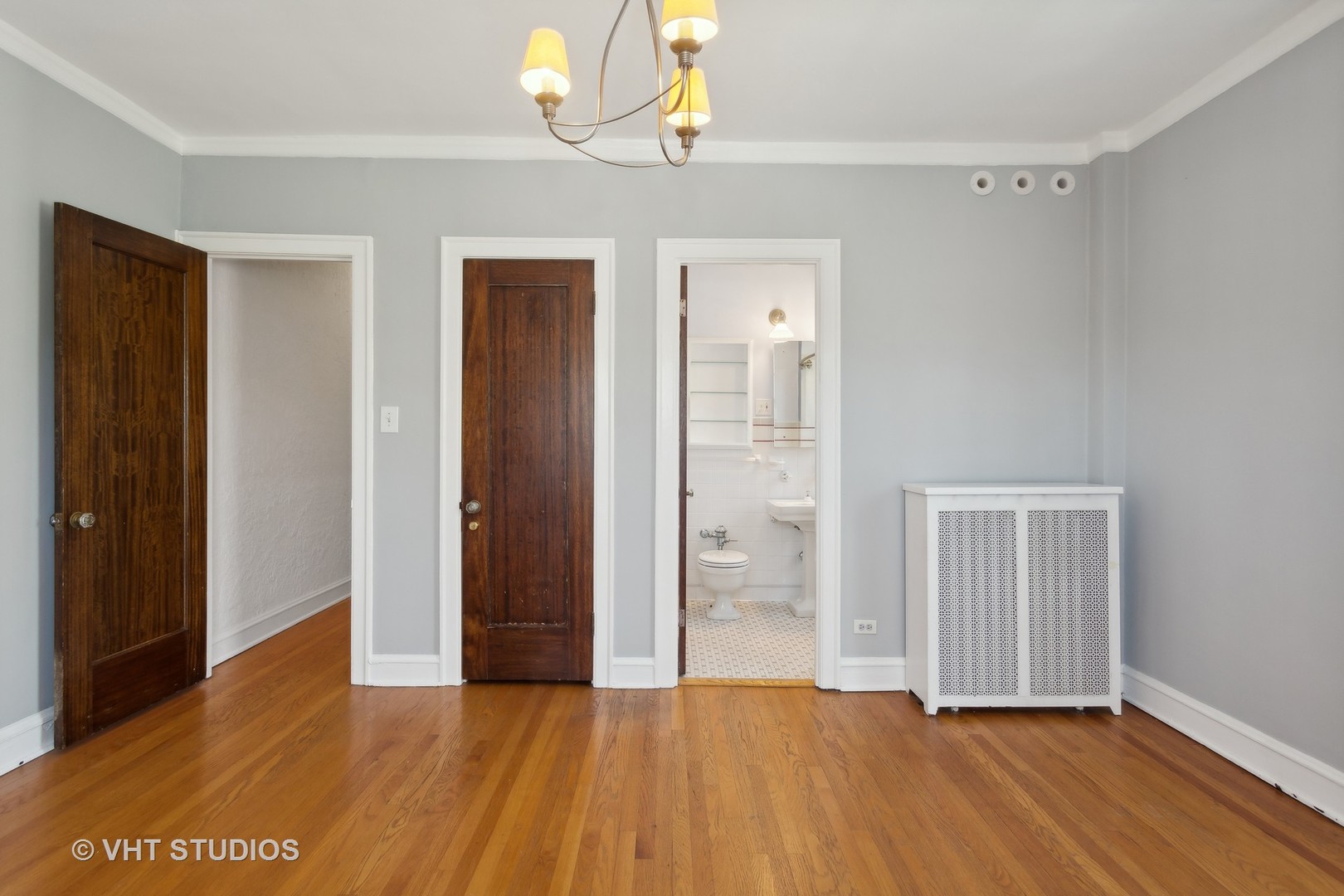 482 Sheridan Road, Unit 3 Evanston, IL 60202 - Photo 21 of 39 wooden floor in an empty room with a window