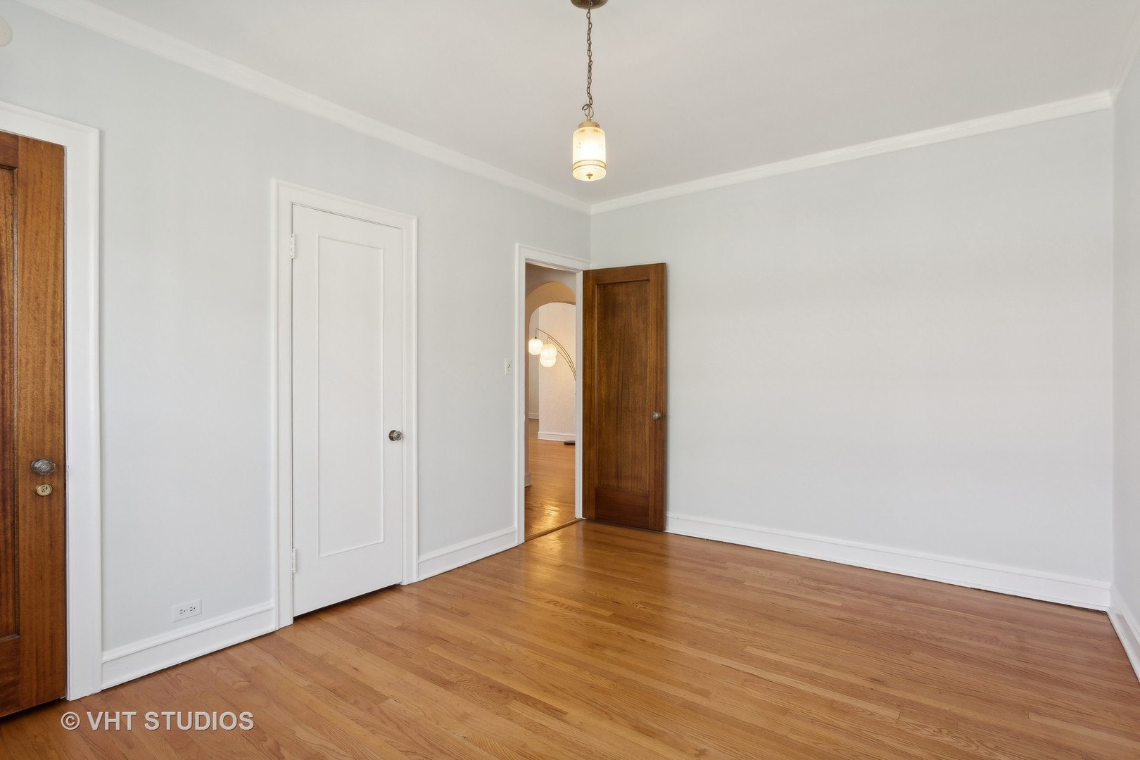 482 Sheridan Road, Unit 3 Evanston, IL 60202 - Photo 24 of 39 a view of an empty room with wooden floor