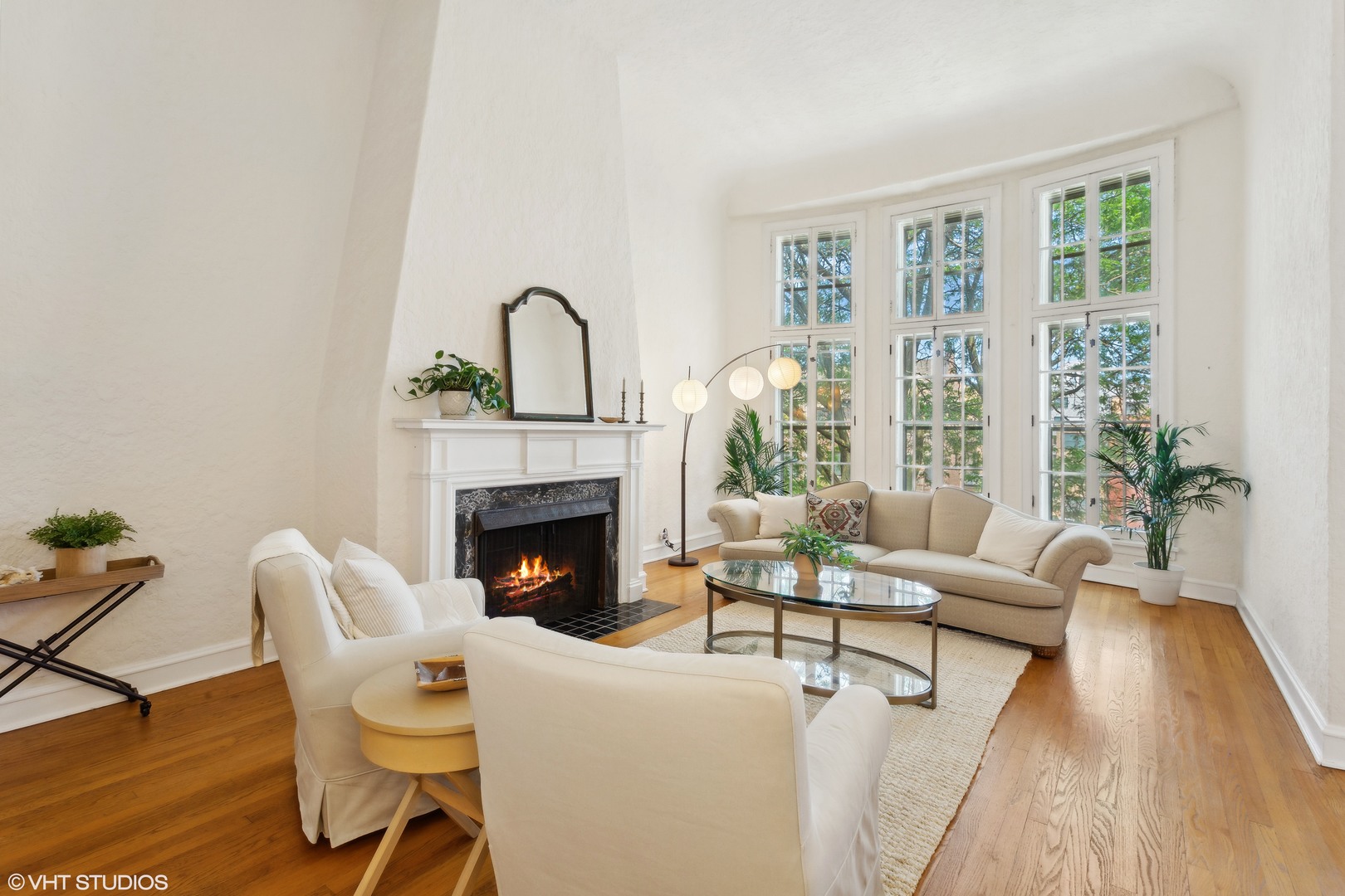 482 Sheridan Road, Unit 3 Evanston, IL 60202 - Photo 6 of 39 a living room with furniture a fireplace and a potted plant with wooden floor