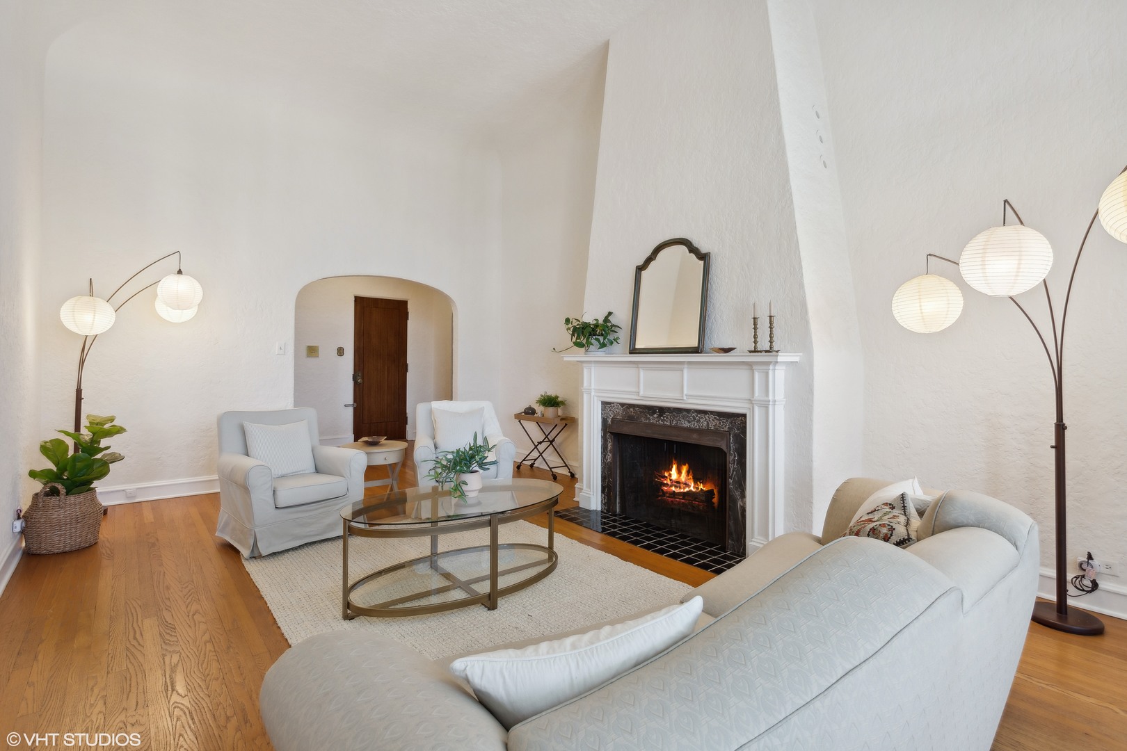482 Sheridan Road, Unit 3 Evanston, IL 60202 - Photo 7 of 39 a living room with furniture and a fireplace