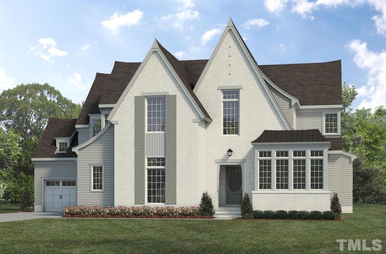 1317 Westfield Avenue Raleigh, NC 27607 - Photo 1 of 29 a front view of a house with a yard