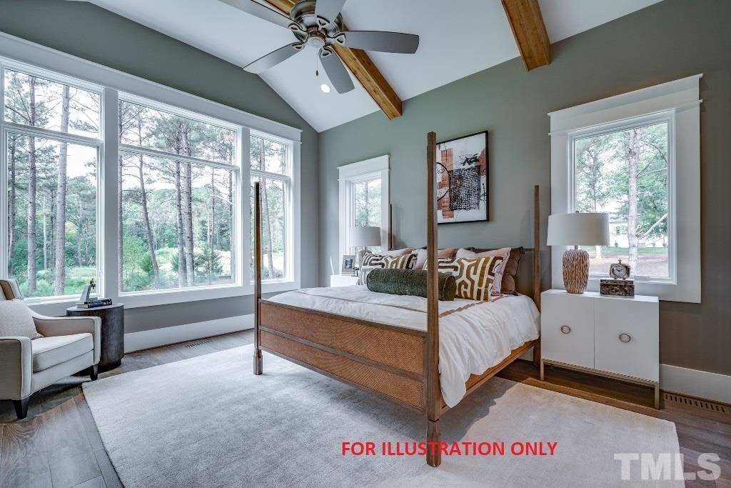 1317 Westfield Avenue Raleigh, NC 27607 - Photo 11 of 29 a bed room with a bed and a large window