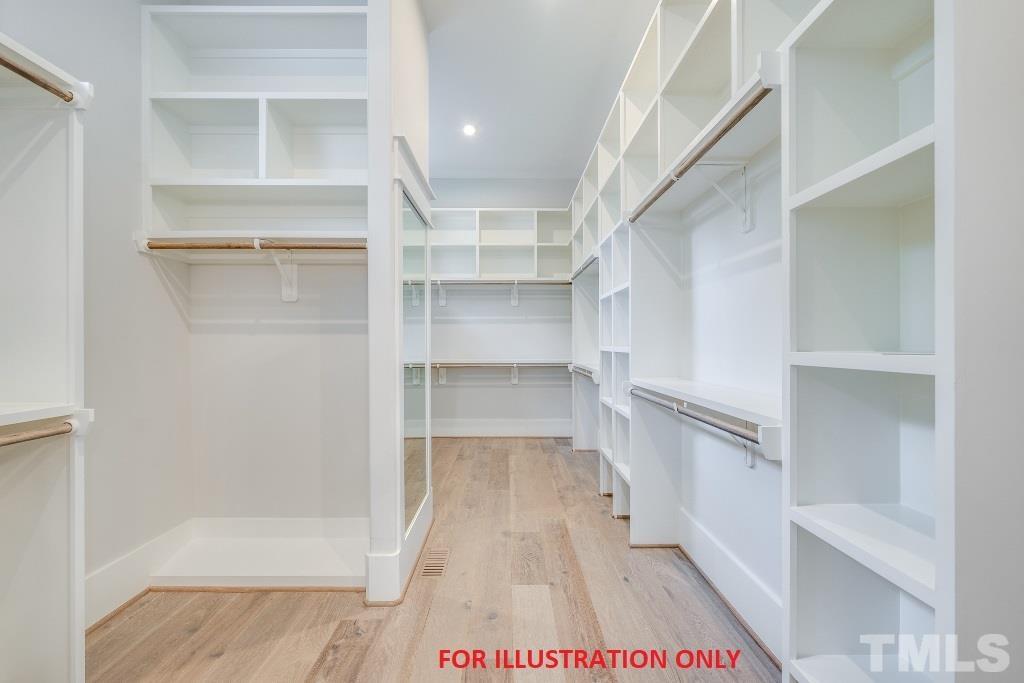 1317 Westfield Avenue Raleigh, NC 27607 - Photo 15 of 29 a view of walk in closet with empty racks