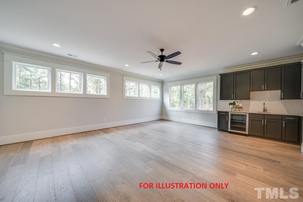 1317 Westfield Avenue Raleigh, NC 27607 - Photo 20 of 29 a view of a kitchen with lots of counter top space stainless steel appliances and windows