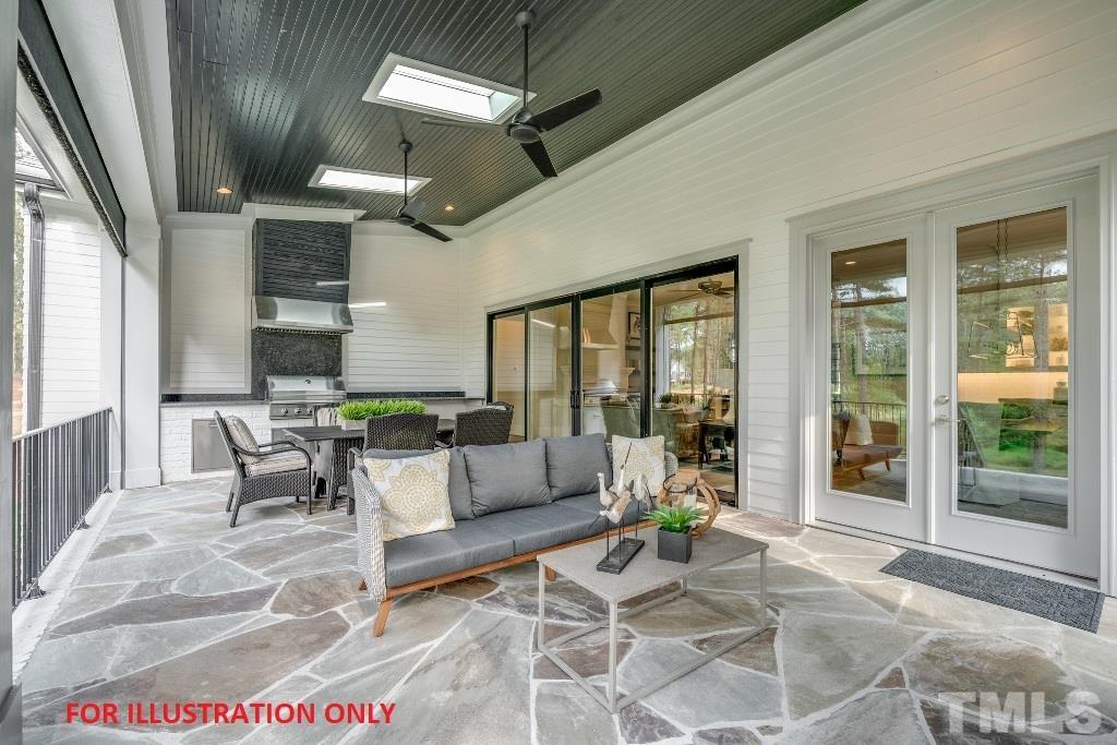 1317 Westfield Avenue Raleigh, NC 27607 - Photo 24 of 29 a living room with furniture and a large window