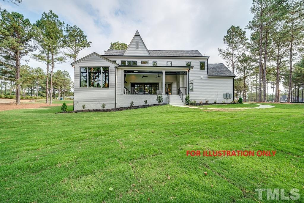1317 Westfield Avenue Raleigh, NC 27607 - Photo 27 of 29 a front view of a house with a yard and trees