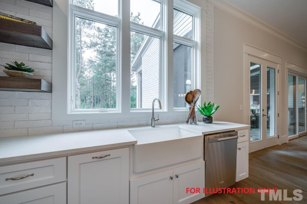 1317 Westfield Avenue Raleigh, NC 27607 - Photo 6 of 29 a sink with a potted plant on the counter