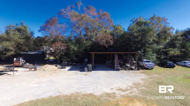 11564 Champion Road Fairhope, AL 36532 - Photo 6 of 14 Pole Barn and Pump House with working Well. Property fully irrigated