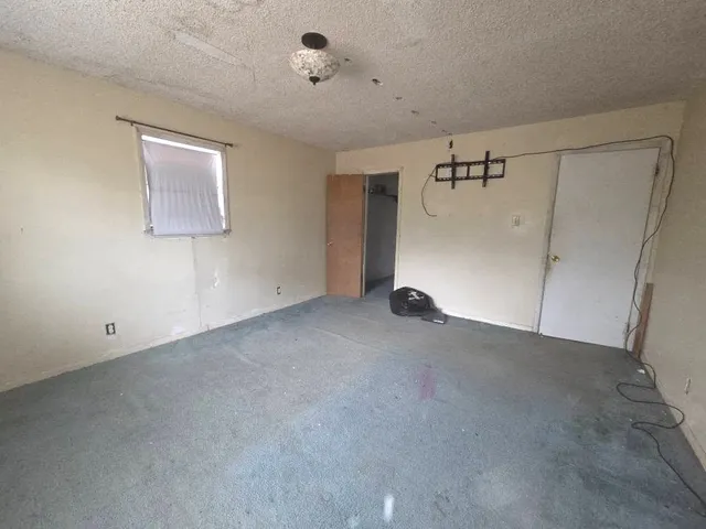 a view of a room with racks on the wall