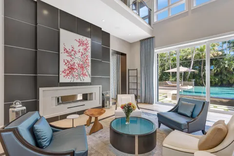 a bath tub sitting next to a shower