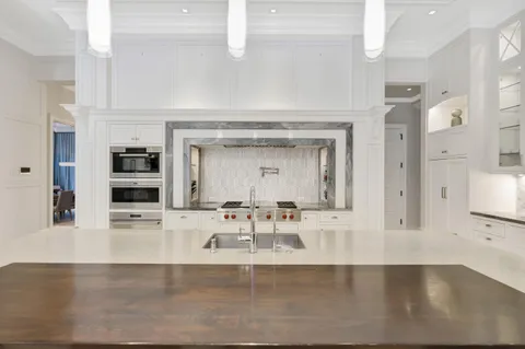 a bedroom with a bed and a night stand