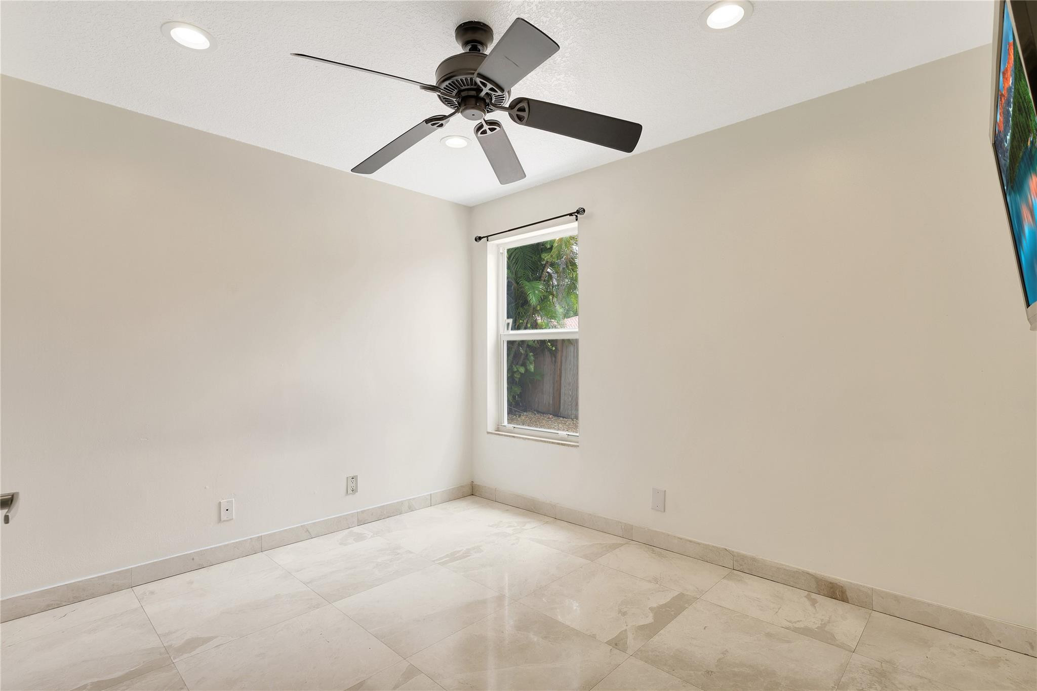 1515 Garden Road Weston, FL 33326 - Photo 19 of 55 Great Back Bedroom with TV and Fan