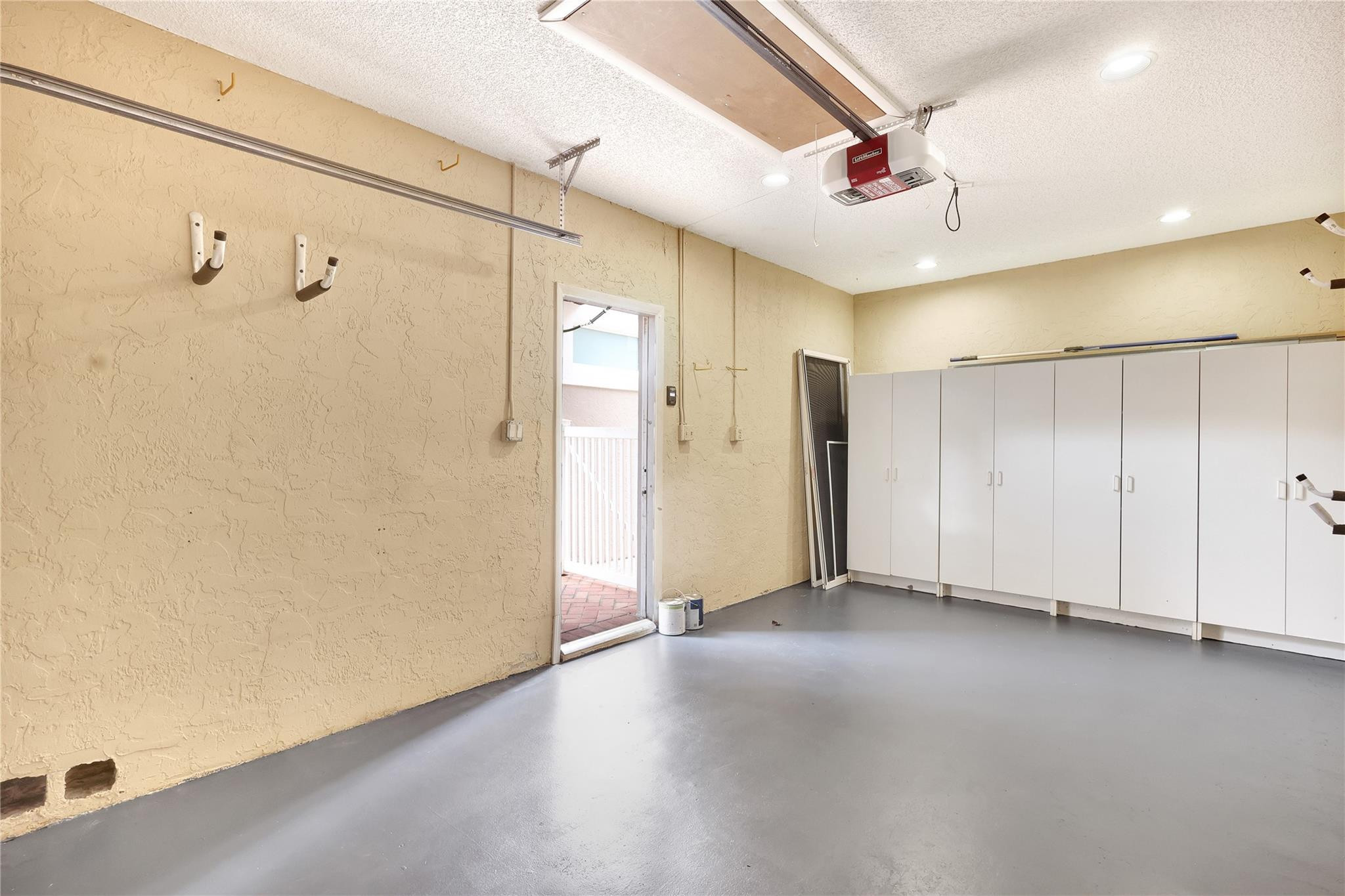 1515 Garden Road Weston, FL 33326 - Photo 24 of 55 Private Garage painted floor and storage