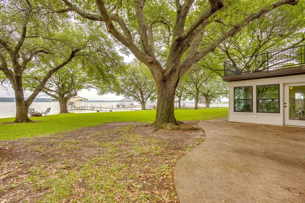 10814 Power Squadron Road Azle, TX 76020 - Photo 27 of 34 a view of outdoor space with garden and trees