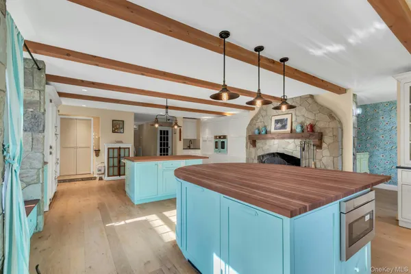 a view of a dining room with furniture and window