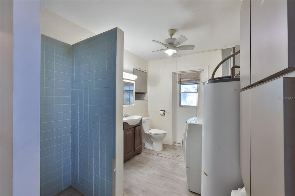 14451 Highland Road Wimauma, FL 33598 - Photo 68 of 80 a bathroom with a toilet and a shower