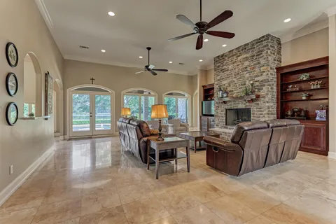 a dining room with furniture window and outside view