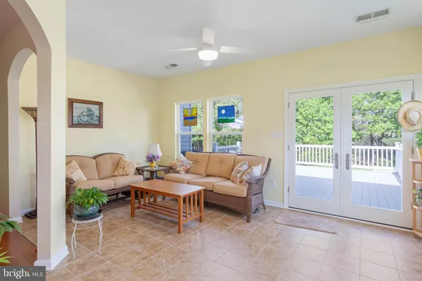 a view of a livingroom with furniture and windows