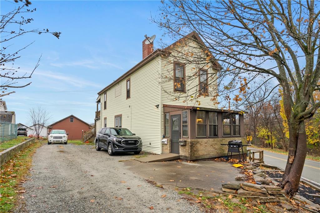 4974 Williamsport Road Elizabeth, PA 15037 - Photo 4 of 34 a view of a house with a patio