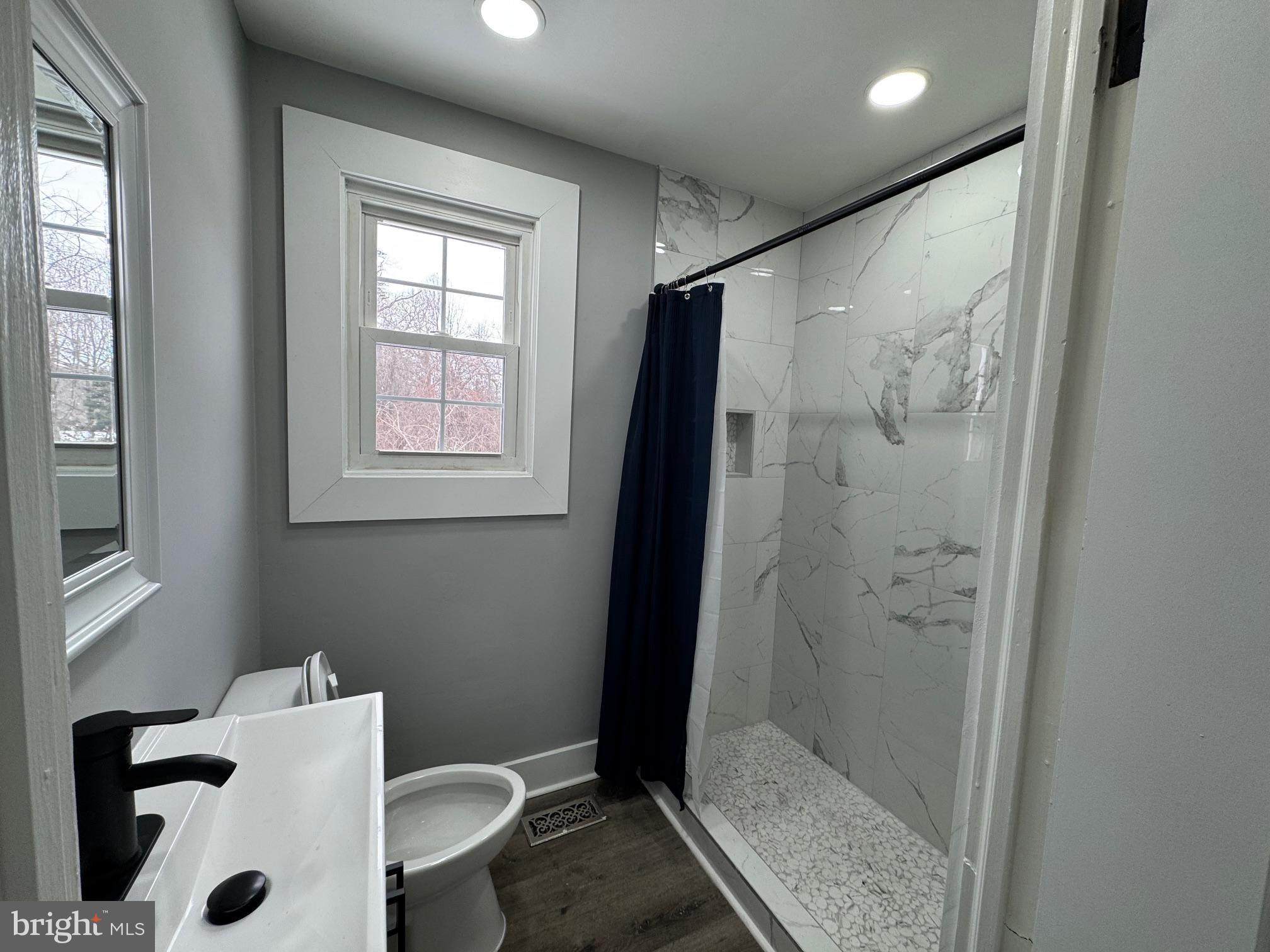 411 Magothy Bridge Road Pasadena, MD 21122 - Photo 5 of 11 Full remolded bathroom