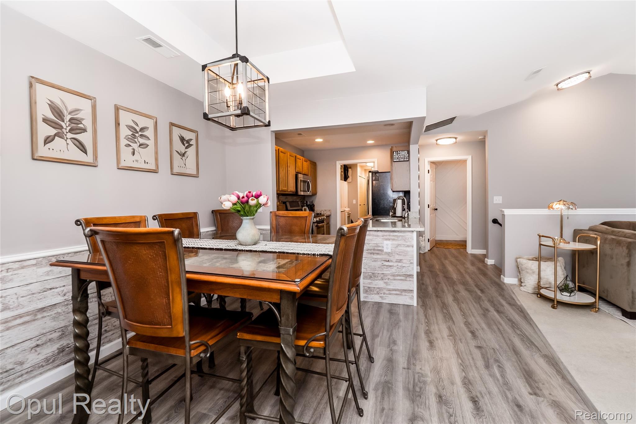 11762 Farmington Road Livonia, MI 48150 - Photo 7 of 25 Dining space with suspended lighting and light wood finished floors