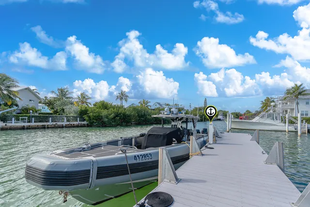a view of swimming pool outdoor seating and city view