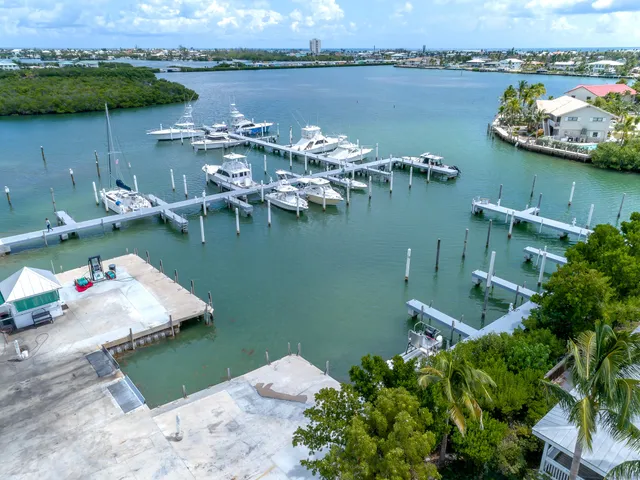 a backyard of a house with outdoor seating and green space