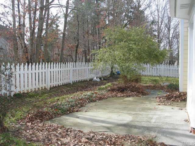 5205 Denmead Way Raleigh, NC 27613 - Photo 12 of 12 Nice large fenced in back yard.