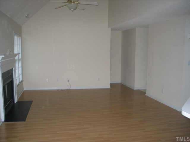 5205 Denmead Way Raleigh, NC 27613 - Photo 6 of 12 Large Family Room with great floors and gas fireplace