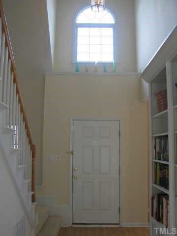 5205 Denmead Way Raleigh, NC 27613 - Photo 10 of 12 View of front hall from family room.