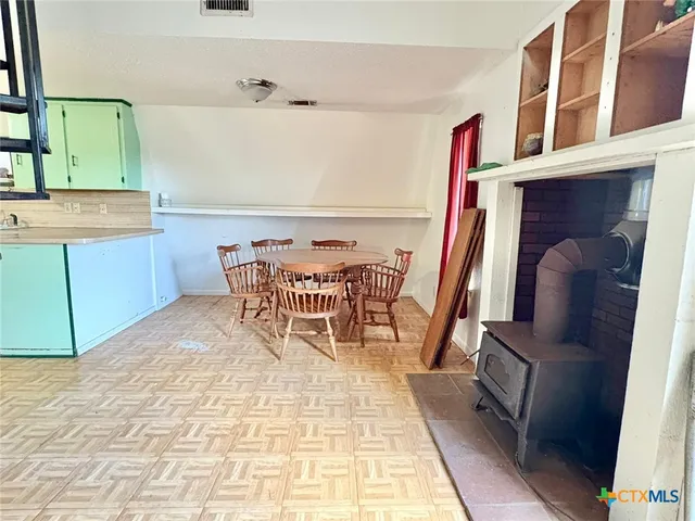 a dining room with furniture and a table