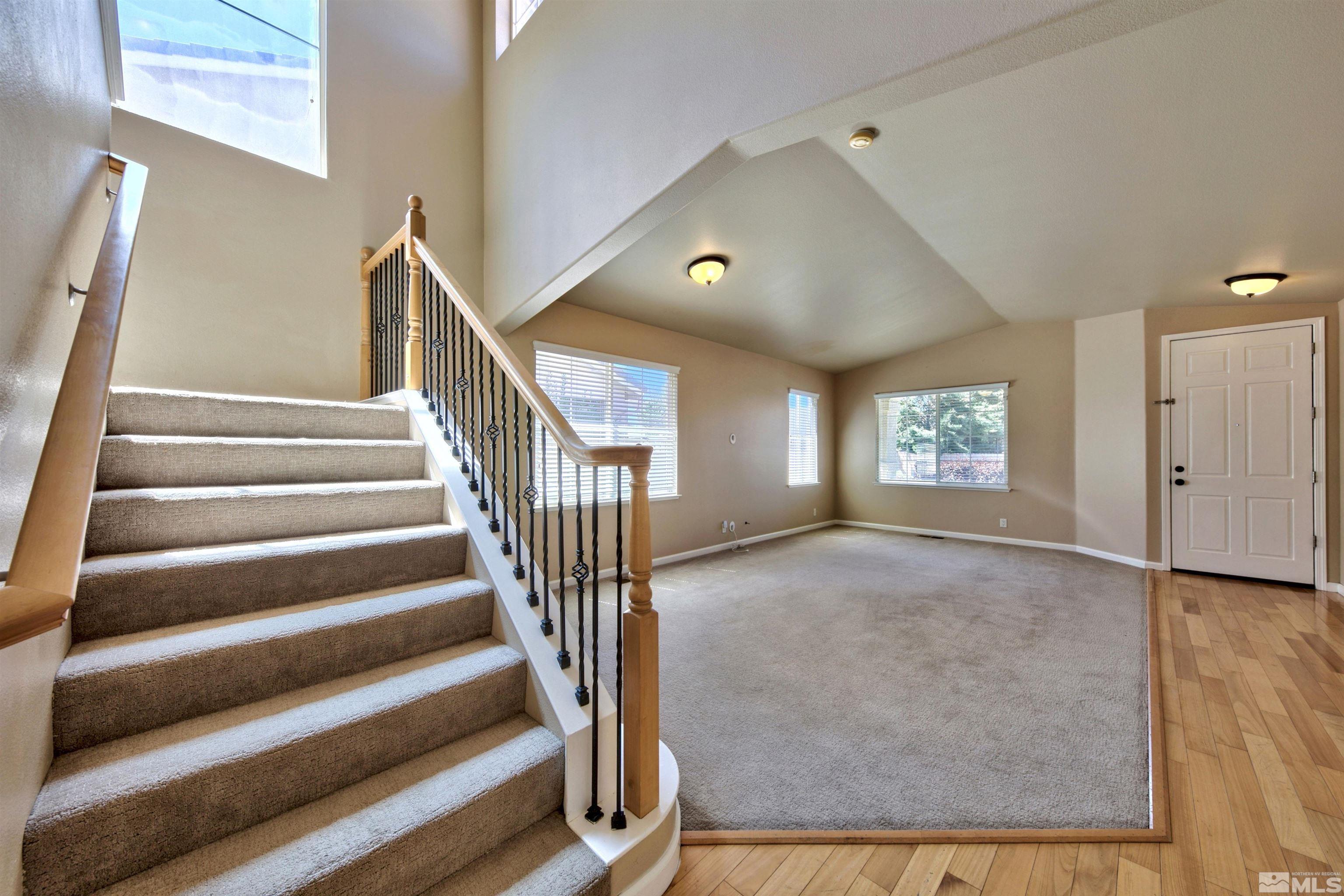 10084 Silver Star Drive Reno, NV 89521 - Photo 2 of 26 a view of entryway and hall with wooden floor