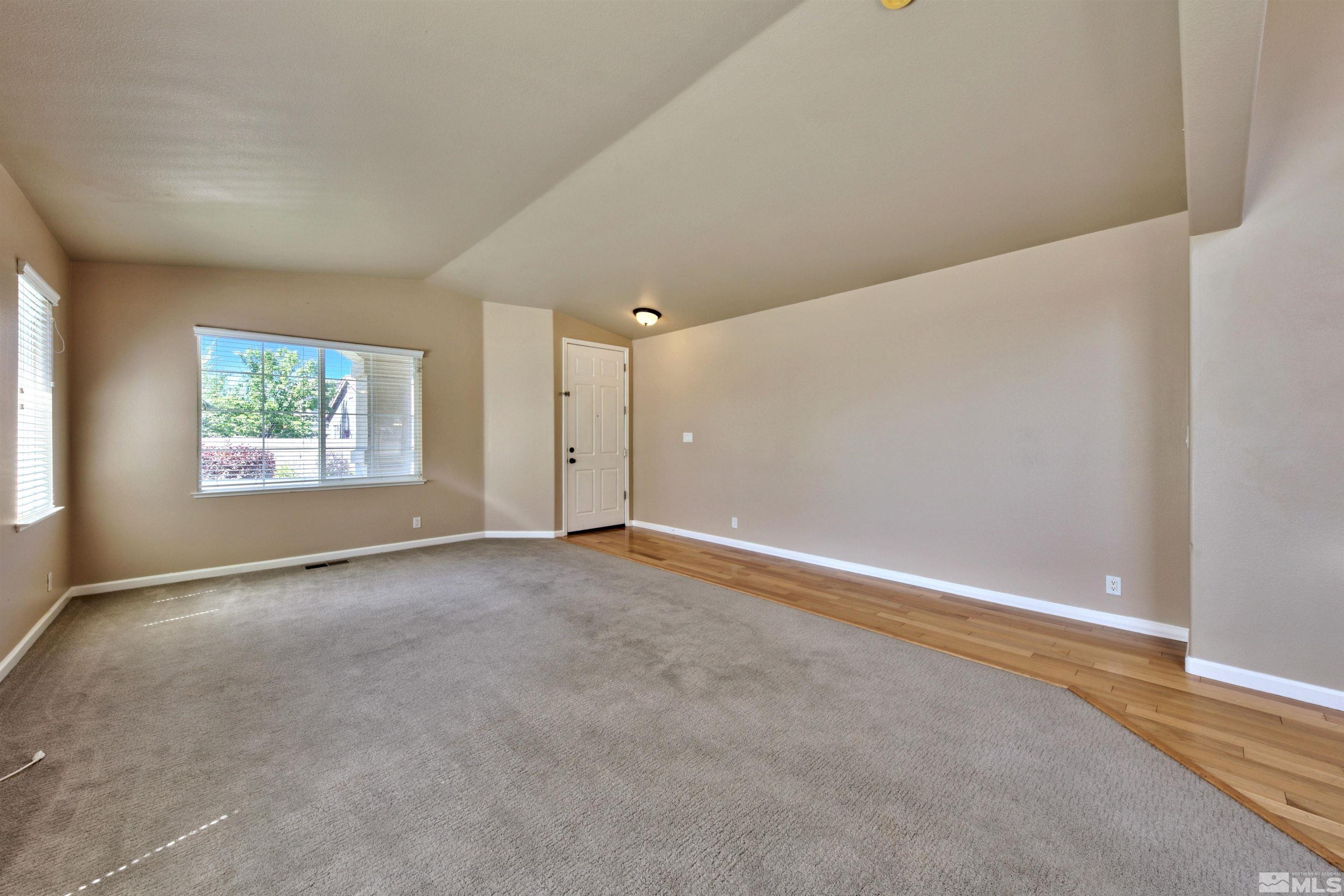 10084 Silver Star Drive Reno, NV 89521 - Photo 21 of 26 an empty room with windows